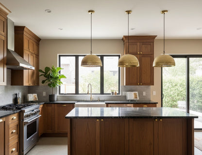Modern kitchen with wooden cabinets, island, and pendant lights.